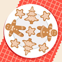 Fototapeta na wymiar Plate with ginger cookies in the form of men, Christmas trees, stars. Winter homemade cakes.