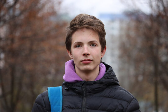 Portrait of a 16 year old boy on the street.