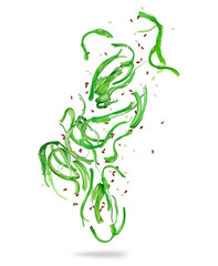 Edible green algae (Chuka Seaweed Salad) in the air close up on a white background