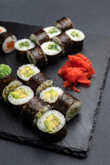 Japanese cuisine. Delicious fried rolls with salmon