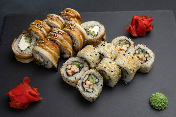 Japanese cuisine. Delicious fried rolls with salmon