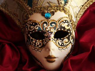 Venetian mask on red background 4