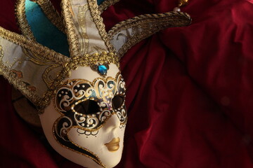Venetian mask on red background 6