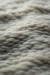 Fototapeta na wymiar Close-up, macro photography of wool knitted products emphasizing the texture of threads and knitting