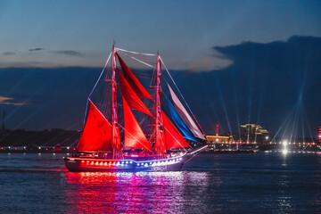 Scarlet sails ship on Neva river on Neva river on alumni celebration. Saint-Petersburg, Russia - obrazy, fototapety, plakaty