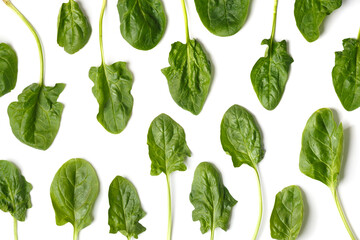 Spinach leaves on white background, top view, flat lay.