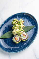 Japanese cuisine. Tuna avocado sushi hand rolls