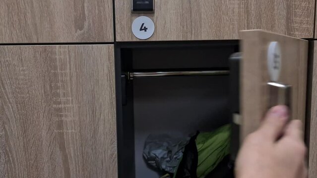 Electronic card to open locker in sports locker room. Locker things and magnetic key