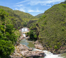 Fototapeta na wymiar Zé Carlinhos Waterfall in Serra da Canastra, adventure tourism in Brazil
