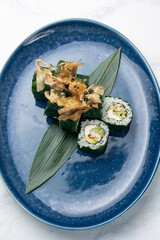 Japanese cuisine. Handmade sushi rolls with eel