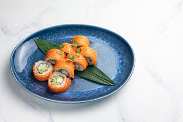 Japanese cuisine. Philadelphia rolls with salmon