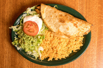 quesadilla with rice and salad