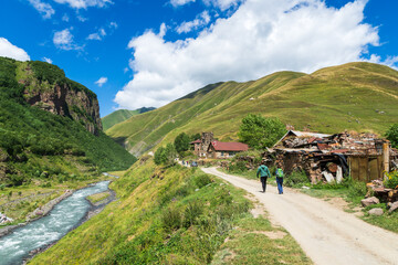 Summer hiking landscape in Georgia, Caucasus. Popular mountain hiking areas in Kazbegi, Truso Gorge area.