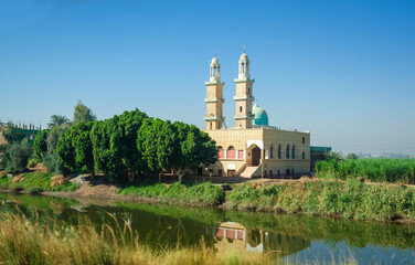 Beautiful village in green valley of Nile river near city Luxor, Egypt, Africa