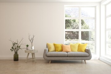White living room with sofa and summer landscape in window. Scandinavian interior design. 3D illustration
