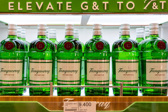 Bottles of Tanqueray London Dry Gin on a shelf in duty free shop airport in Muscat, Oman