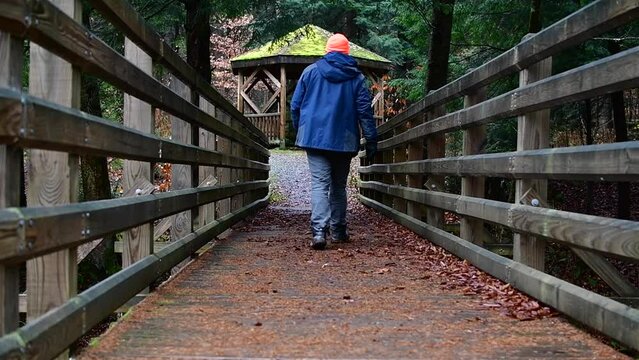 hiker hunting hat, during  bad wether walk activity