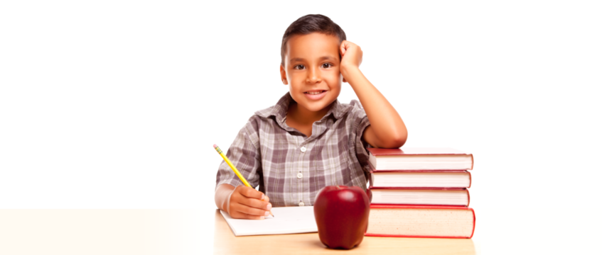 Happy Young Hispanic School Boy At Desk with Books and Apple Isolated. Transparent PNG.