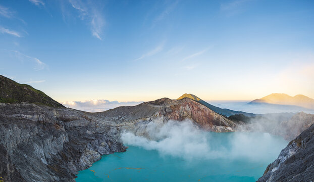 Mount Ijen, a volcano and sulphur mine located near Banyuwangi in East Java, Indonesia. Panoramic image of Ijen crater, a famous touristic destination for tourists in Java island, Indonesia. 
