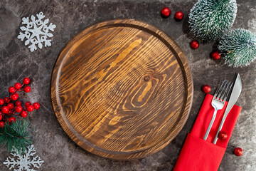 Christmas table setting, with Christmas decorations. Top view, copyspace.