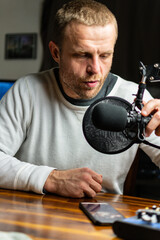 Podcasting studio set up man on the mic