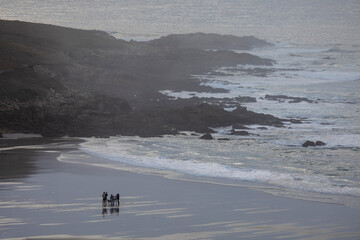 Tourists walking on Caión beach. Laracha, A Coruña