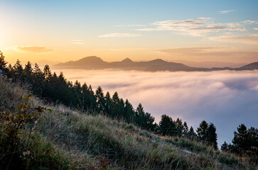Misty autumn mountain landscape in the morning, Poland, Beskidy and Pieniny mountains seen from Wdzar peak