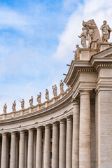 Obraz premium Columns and statues at St. Peter's Basilica in Vaticam, ROme, Lazio region, Italy