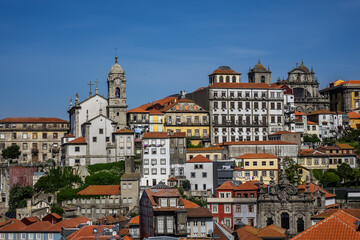Fototapeta na wymiar Panoramic view of the picturesque multicolored buildings in the historic center of the Porto city. Porto, Portugal.