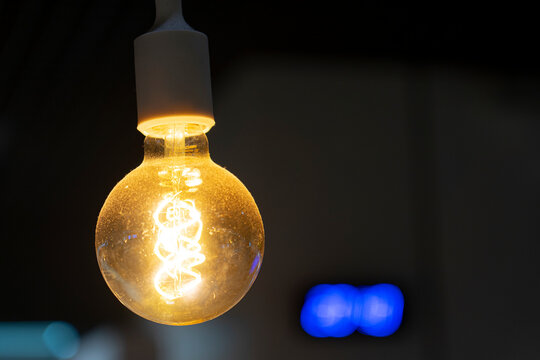 ornamental incandescent lamp with helicoidal filament for a relaxed atmosphere.