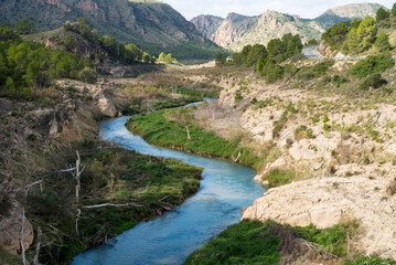 Fototapeta na wymiar Rio Segura as it passes through Elche de la Sierra, in the heart of the province of Albacete, Spain