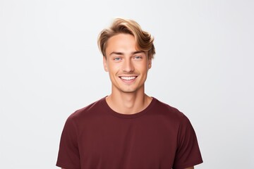 Handsome Fictional Male Model with Blue Eyes Smiling Candidly. Casual Clothes. Isolated on a Plain White Background. Generative AI. - obrazy, fototapety, plakaty