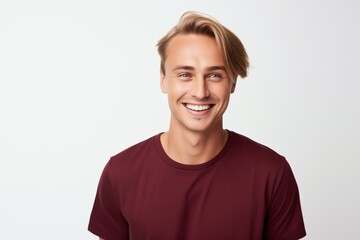 Handsome Fictional Male Model with Blue Eyes Smiling Candidly. Casual Clothes. Isolated on a Plain White Background. Generative AI.