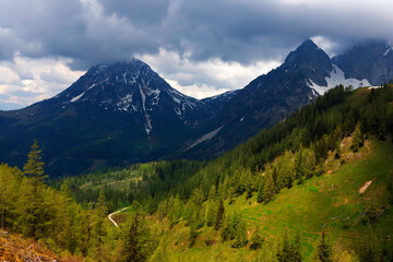 Obraz premium The Dachstein mountain range under stormy clouds, Upper-Austria, Europe