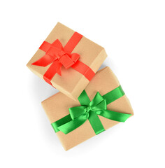 Christmas gift boxes with red and green ribbons on white background