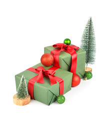 Gift boxes with Christmas trees and balls on white background