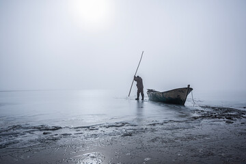 The story of a fisherman who wants to make a way for herself on a frozen lake on winter days and...