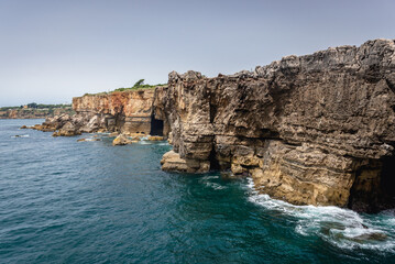 Fototapeta na wymiar Boca do Inferno - Hells Mouth chasm in the seaside cliffs near Cascais, District of Lisbon in Portugal