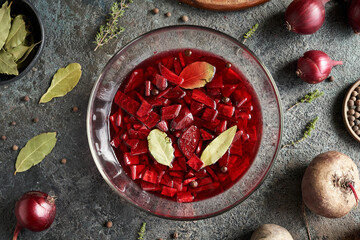 Homemade fermented red beet kvass in a glass bowl - obrazy, fototapety, plakaty