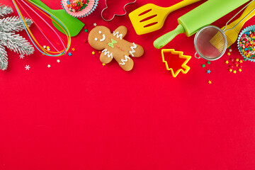 Preparing Christmas confections concept. Top view photo of sweet cookies, candies, pastry tools,...