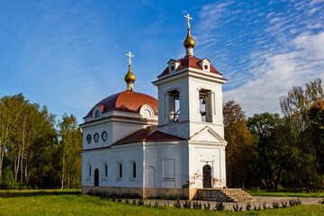 Fototapeta na wymiar Old Russian Orthodox Church in the countryside after restoration. Kaluga region, Russia