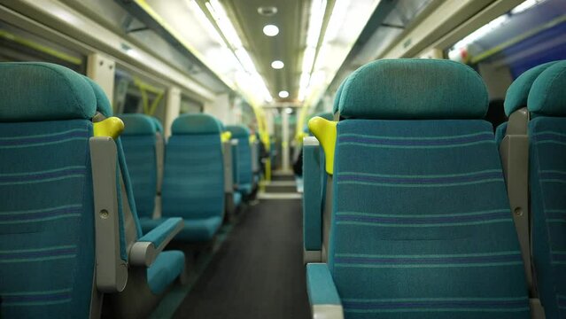 Empty train seats with nobody. No passengers on public transportation