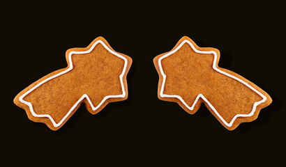 Decorated gingerbread star isolated on black background