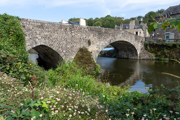medieval stone arch bridge over La Rance river, Dinan France