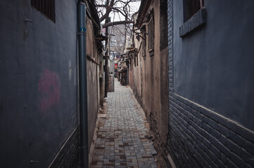 Narrow alley in hutong area in Beijing city, China