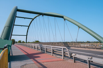 Fototapeta na wymiar Bridge in Gdansk, Poland. Two lines for pedestrians and bikers. Empty bridge, no people, no cars in Gdansk Poland