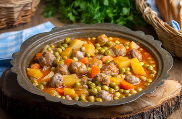 Turkish Food Green Pea Stew with Meatballs - Kofte or Kofta Bezelye. (Turkish name; kofteli bezelye)