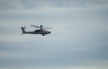 British army Boeing Apache Attack helicopter gunship AH64E (AH-64E ArmyAir606) in flight