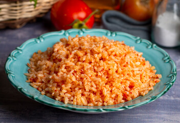 Traditional delicious Turkish food; rice pilaf with tomatoes (Turkish name; Domatesli pirinc pilavi)