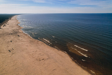 Forest Landscape AERIAL view drone with sandy beach of Baltic Sea in Poland green forest. Nature reserve on Sobieszewo island in Gdansk Poland